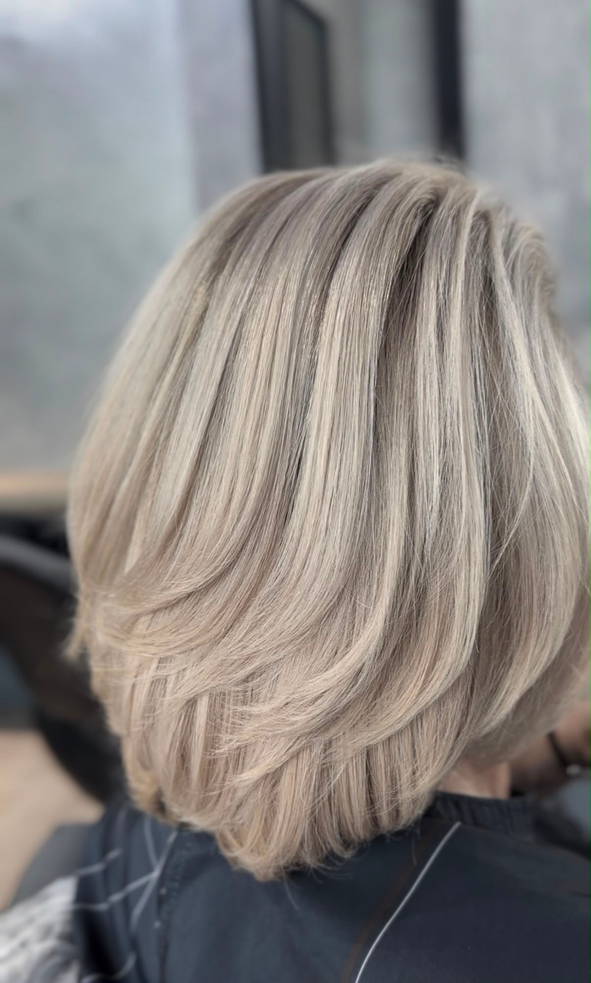 Icy-blonde layered bob cut