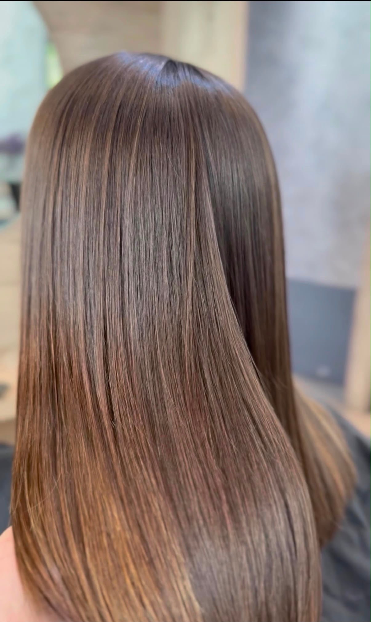 Long straight brunette hair, back view